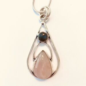 2 inch, 925 marked, Rose Quartz and and Black Onyx pendant on a silver chain.
